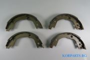 НАКЛАДКИ ЗАДНИ ЧЕЛЮСТНИ (РЪЧНА СПИРАЧКА)  SONATA/MAGENTIS (05-10), SPORTAGE (04-07)/TUCSON -10)(2WD)
